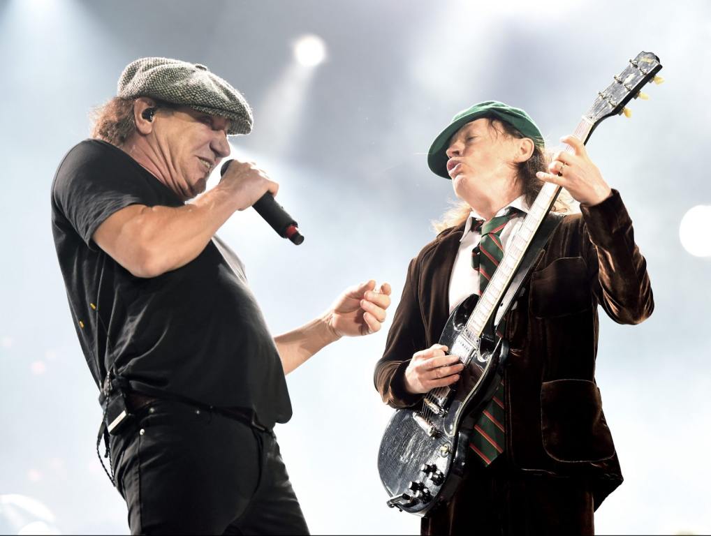 Brian Johnson (L) and musician Angus Young of AC/DC perform at Dodger Stadium on September 28, 2015 in Los Angeles, California.