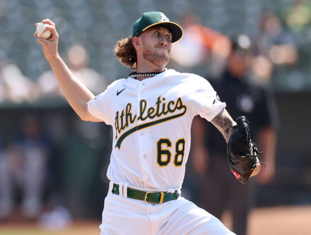 Joey Estes of the Oakland A's throwing a pitch.