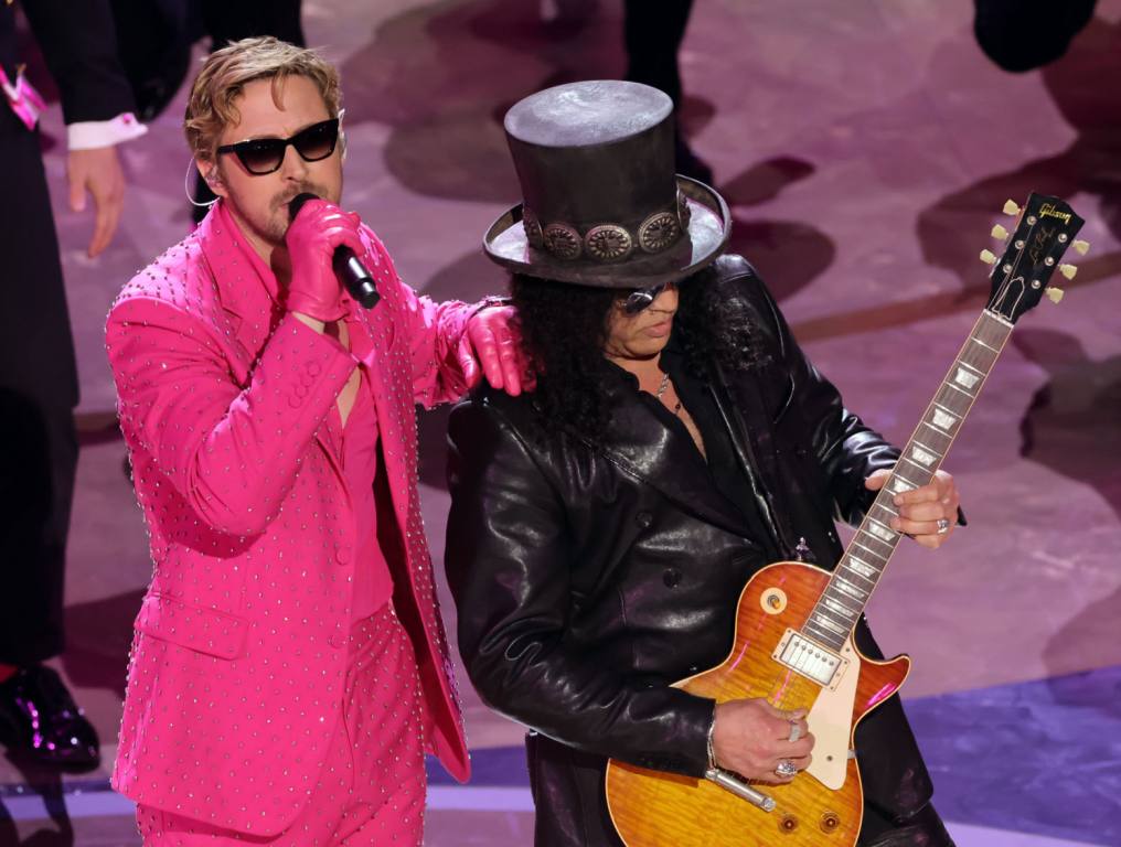 Ryan Gosling and Slash perform 'I'm Just Ken' from "Barbie" onstage during the 2024 Oscars at Dolby Theatre on March 10, 2024 in Hollywood, California.