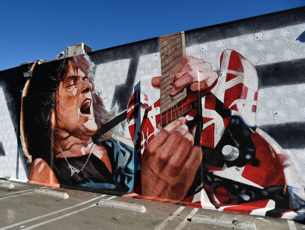 The Eddie Van Halen mural "Long Live The King" by artist Robert Vargas is unveiled at Guitar Center on January 26, 2021 in Hollywood, California.