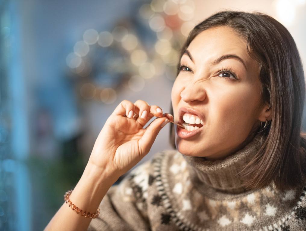 A woman picking her teeth, it might be gross but you love her anyway!