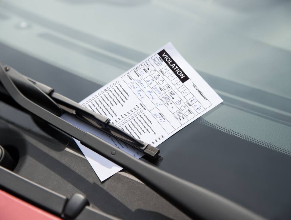 parking ticket on car