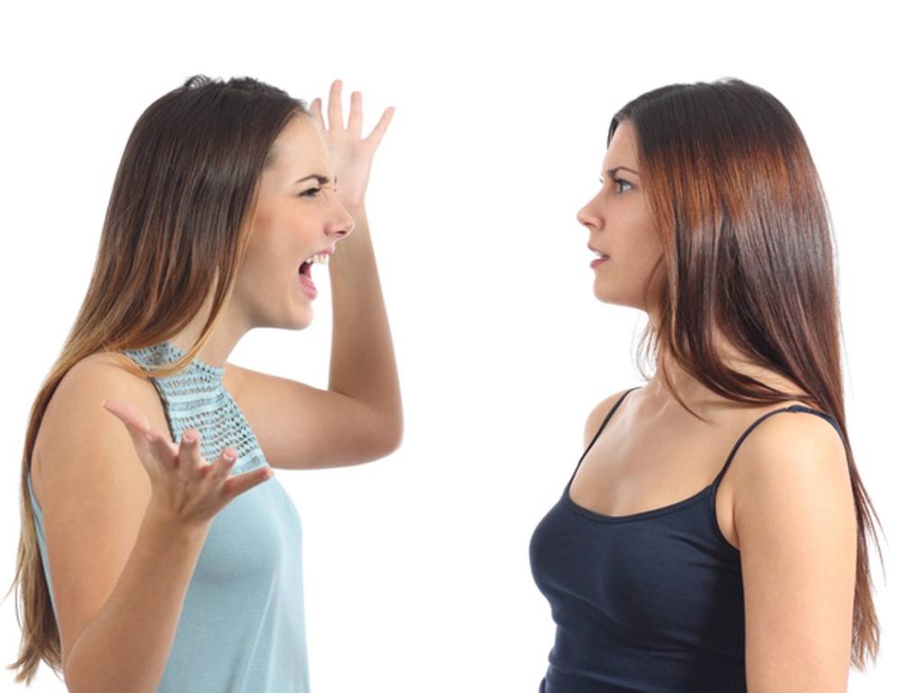 two women facing each other one women being argumentative