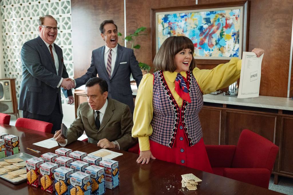 (L to R) Jim Gaffigan as Edsel Kellogg III, Jerry Seinfeld (Director) as Bob Cabana, Fred Armisen as Mike Puntz and Melissa McCarthy as Donna Stankowski in 'Unfrosted,' the Pop-Tarts Movie.