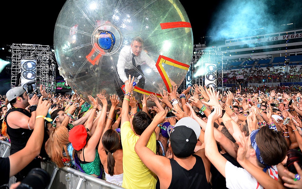 LAS VEGAS, NV - JUNE 23: DJ/producer Diplo of Major Lazer surfs the crowd as he performs at the 17th annual Electric Daisy Carnival at Las Vegas Motor Speedway on June 23, 2013 in Las Vegas, Nevada. (Photo by Ethan Miller/Getty Images)