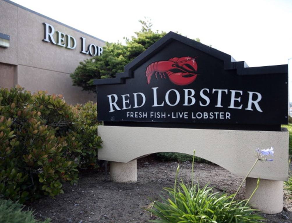 A sign is posted in front of a Red Lobster restaurant on May 16, 2014 in San Bruno, California.