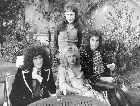 British rock group Queen at Les Ambassadeurs, where they were presented with silver, gold and platinum discs for sales in excess of one million of their hit single 'Bohemian Rhapsody', which was No 1 for 9 weeks.