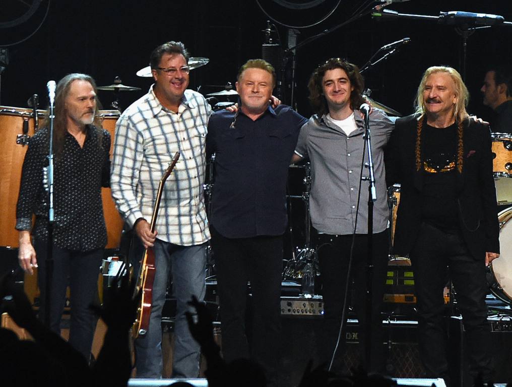 Eagles, Timothy B. Schmit, Vince Gill, Don Henley, Decon Frey and Joe Walsh perform during the Eagles in Concert at The Grand Ole Opry on October 29, 2017 in Nashville, Tennessee.