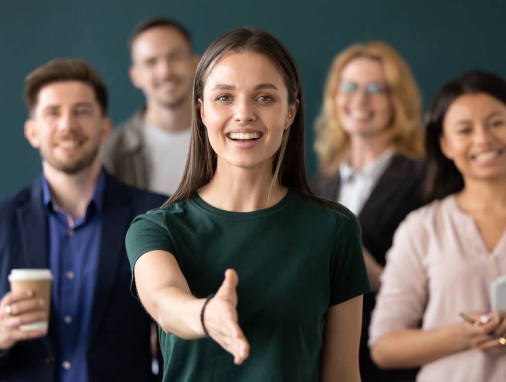 Co-workers greeting you at work and wanting to know how you're doing.