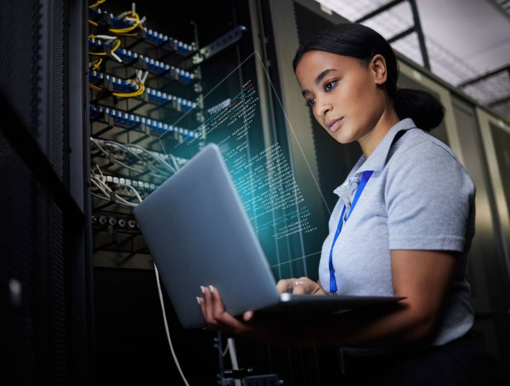 A woman working on tech.