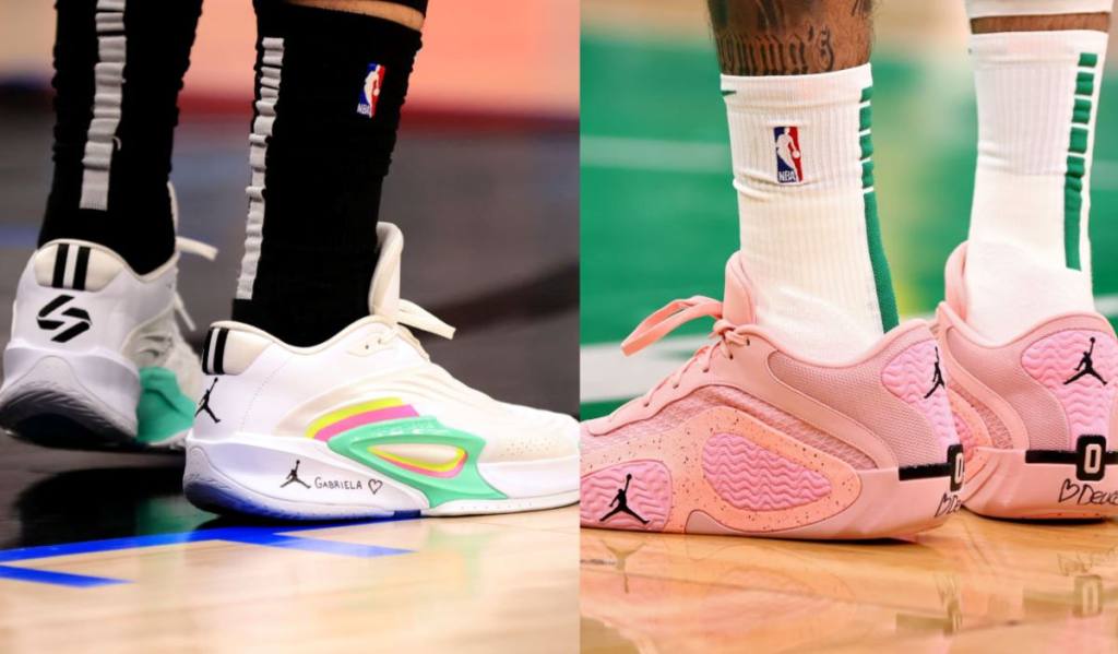 White Jordan sneakers and pink Jordan sneakers worn on a basketball court. Jordan in the NBA Finals