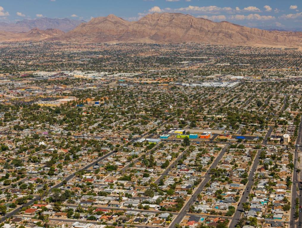 A new northwest Las Vegas master-planned community, similar to others in Southern Nevada such as Southern Highlands and Skye Canyon will soon be under construction. Aerial view of the sprawling desert landscape of Las Vegas on a sunny day. Shows the population growing as the housing communities push right up against the western mountains.