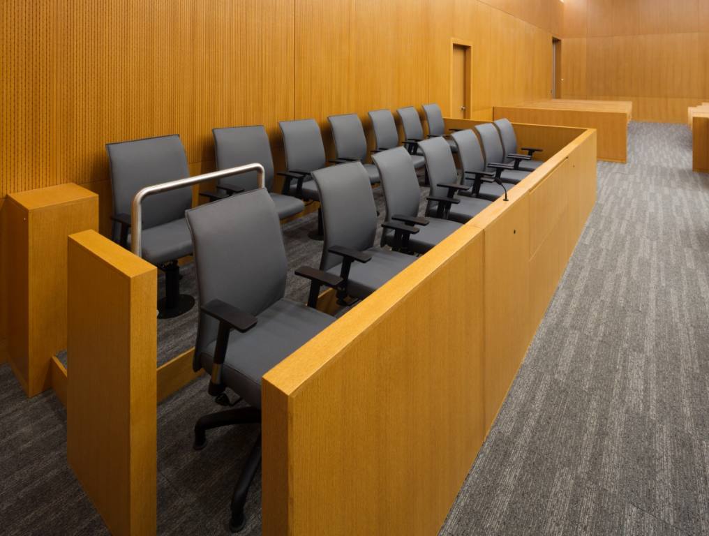 An empty jury box in a new courtroom