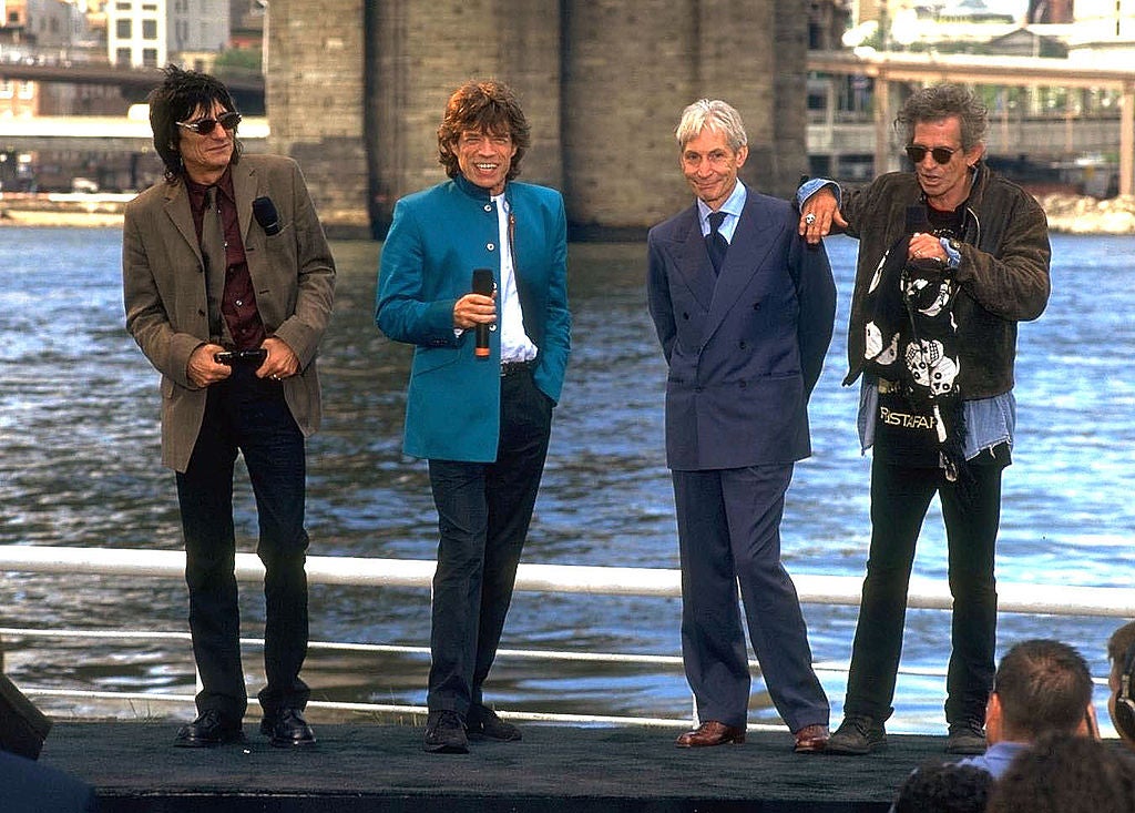 Ronnie Wood, Mick Jagger, Charlie Watts and Keith Richards of the Rolling Stones at a press event in the '90s