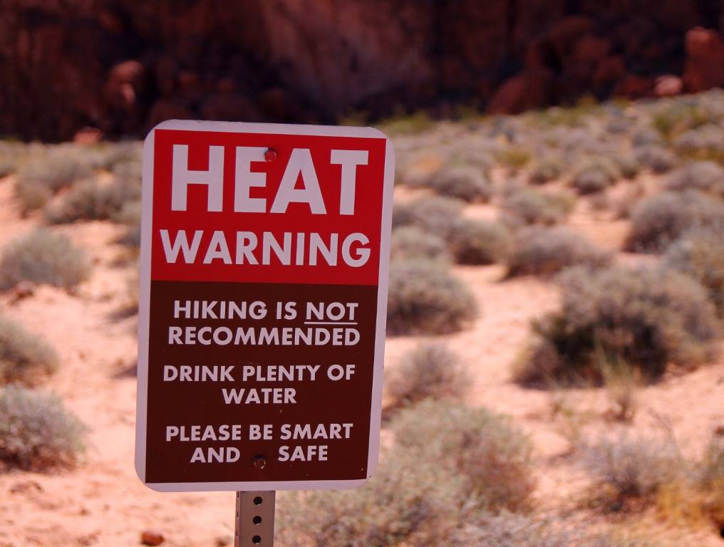 A photo of a warning sign that says "extreme heat." This week, the Las Vegas heat may break records.