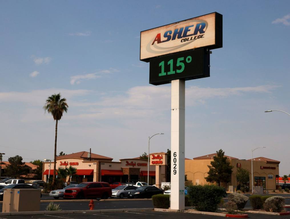 A digital sign displays a temperature of 115 degrees Fahrenheit as a heat wave continues to bake the Southwest United States