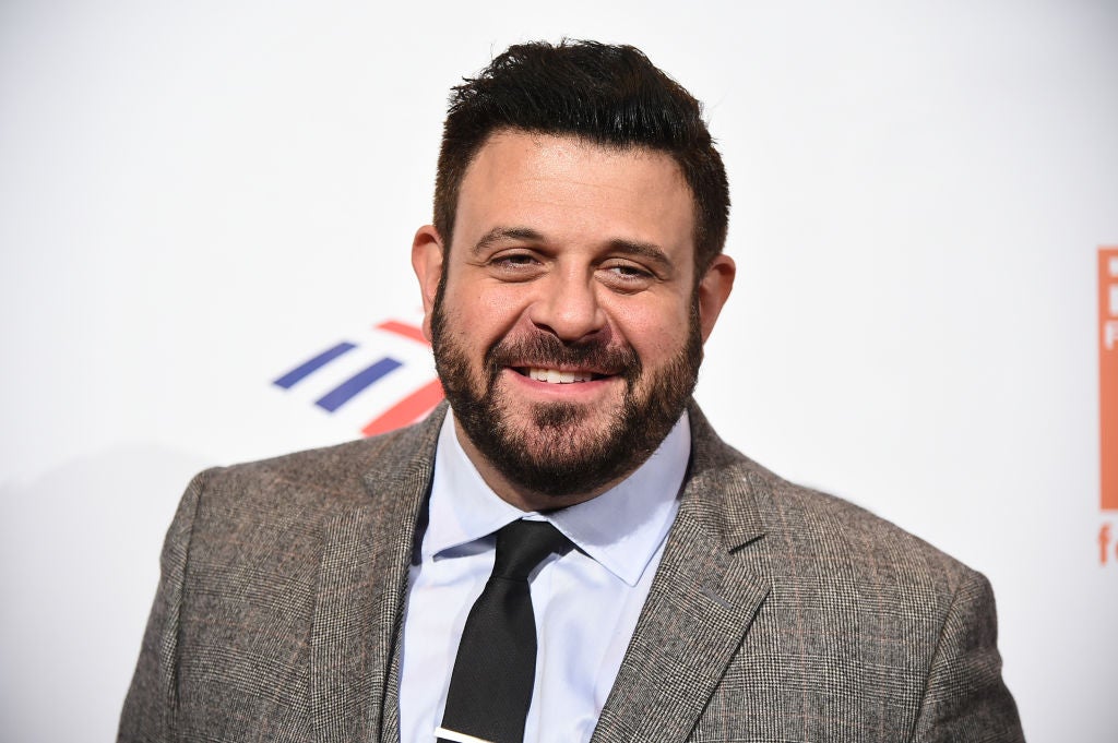 Adam Richman, host of Man v Food at an event.