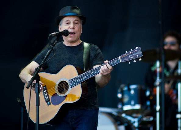 Paul Simon performs live on the pyramid stage during the Glastonbury Festival at Worthy Farm, Pilton on June 26, 2011 in Glastonbury, England.