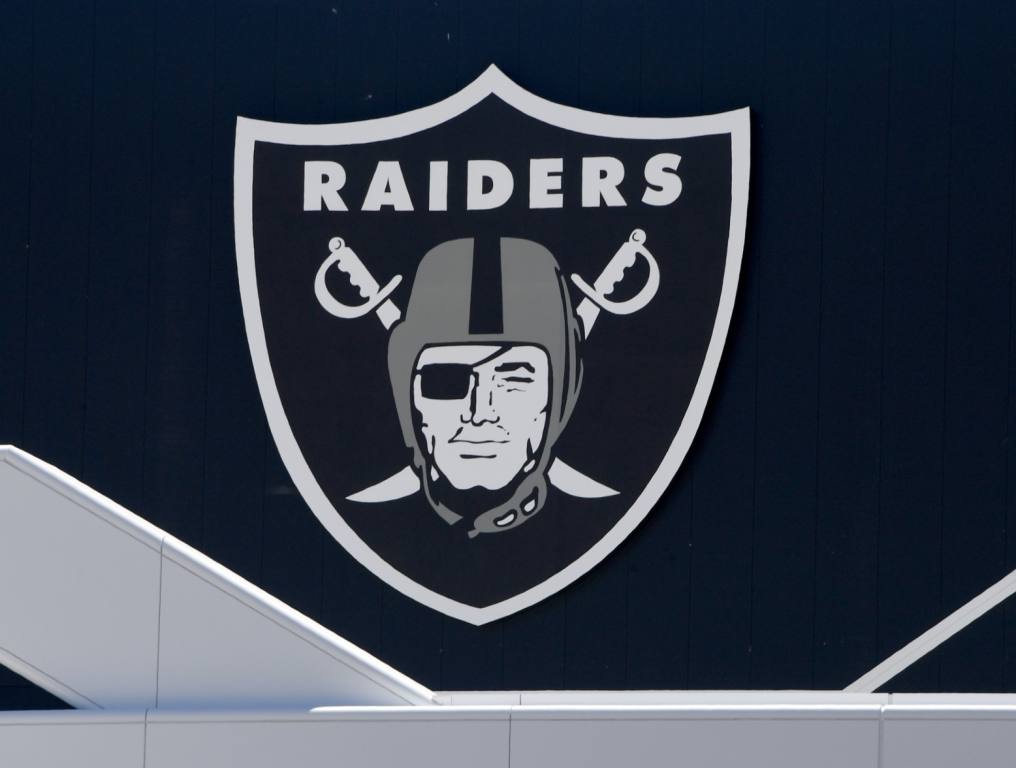 A team logo is shown above the entrance at the 336,000-square-foot Las Vegas Raiders Headquarters/Intermountain Healthcare Performance Center,