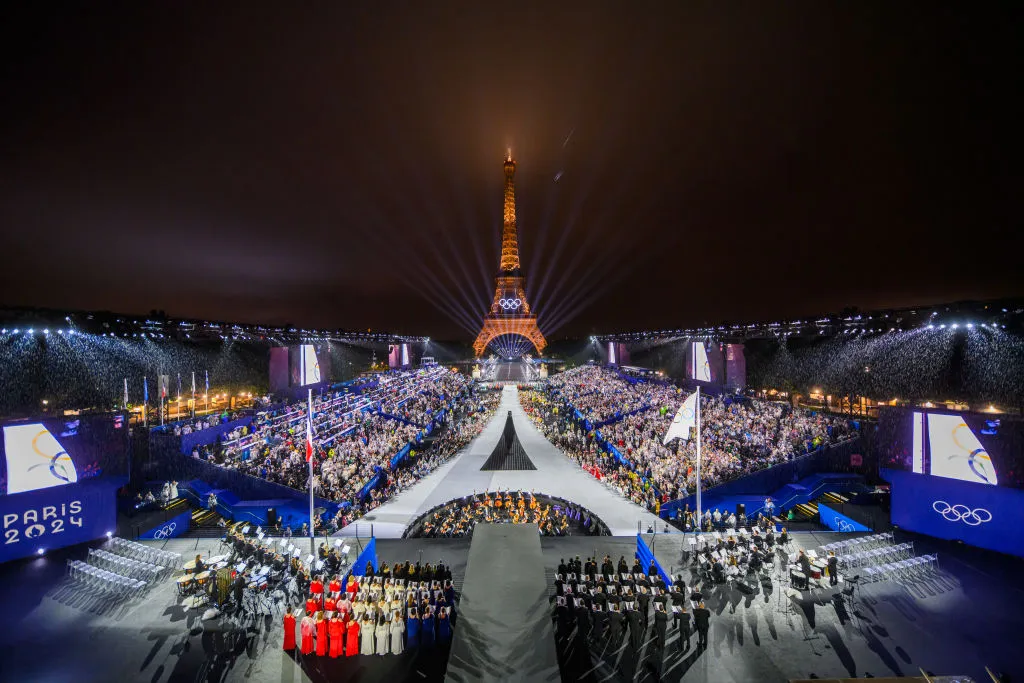 The Olympic flag is rasied at the Place du Trocadero in front of the Eiffel Tower during the Opening Ceremony of the Olympic Games Paris 2024. How do you watch the Paris Olympics closing ceremony? Here's all the information you need to enjoy the festivities.