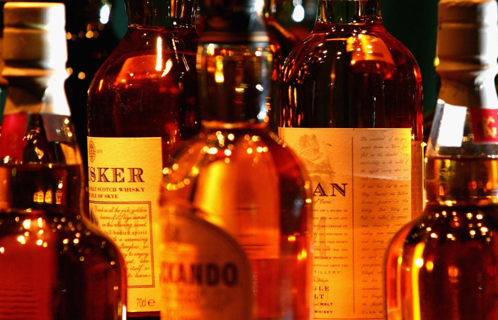 A picture of whiskeys on a shelf