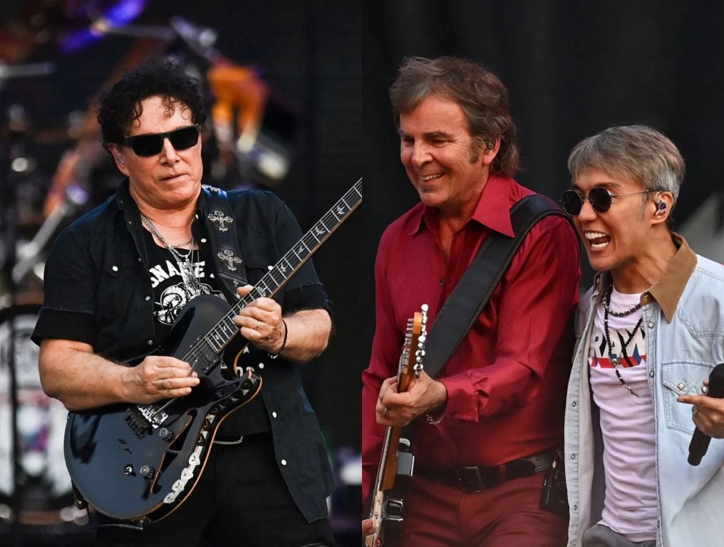 Neal Schon of Journey performs onstage during the "Summer Stadium" tour at Truist Park on July 13, 2024 in Atlanta, Georgia; Jonathan Cain and Arnel Pineda of Journey perform onstage during the "Summer Stadium" tour at Truist Park on July 13, 2024 in Atlanta, Georgia.