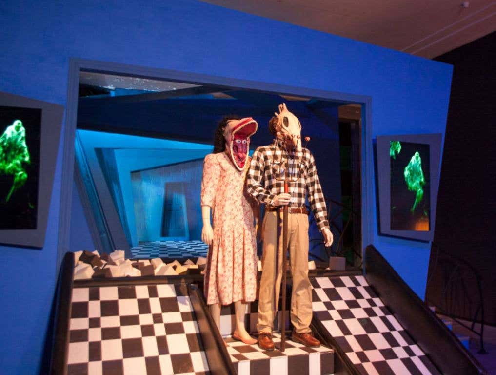 A display of costumes in the dining room of the iconic Beetlejuice house.