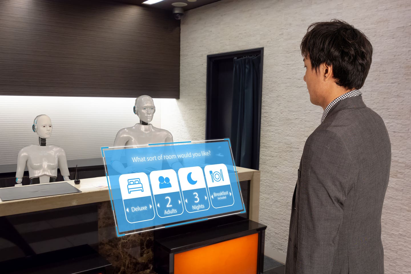 smart hotel in hospitality industry 4.0 concept, the receptionist robot (robot assistant ) in lobby of hotel or airports always welcome customer the service is including room, information provision