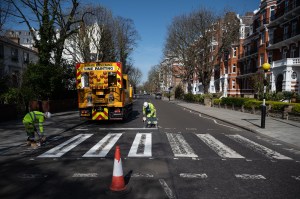 GALLERY: Abbey Road Crosswalk Gets Repainted During Coronavirus Lockdown