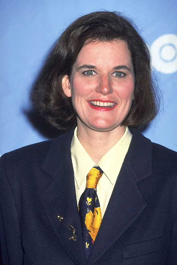 Paula Poundstone in suit with yellow tie