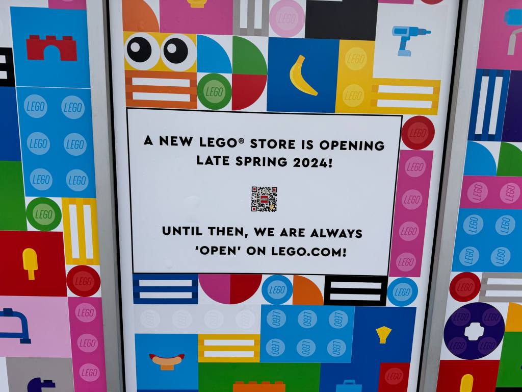 New LEGO Store sign on the side of the building on the opening date being late spring of 2024.