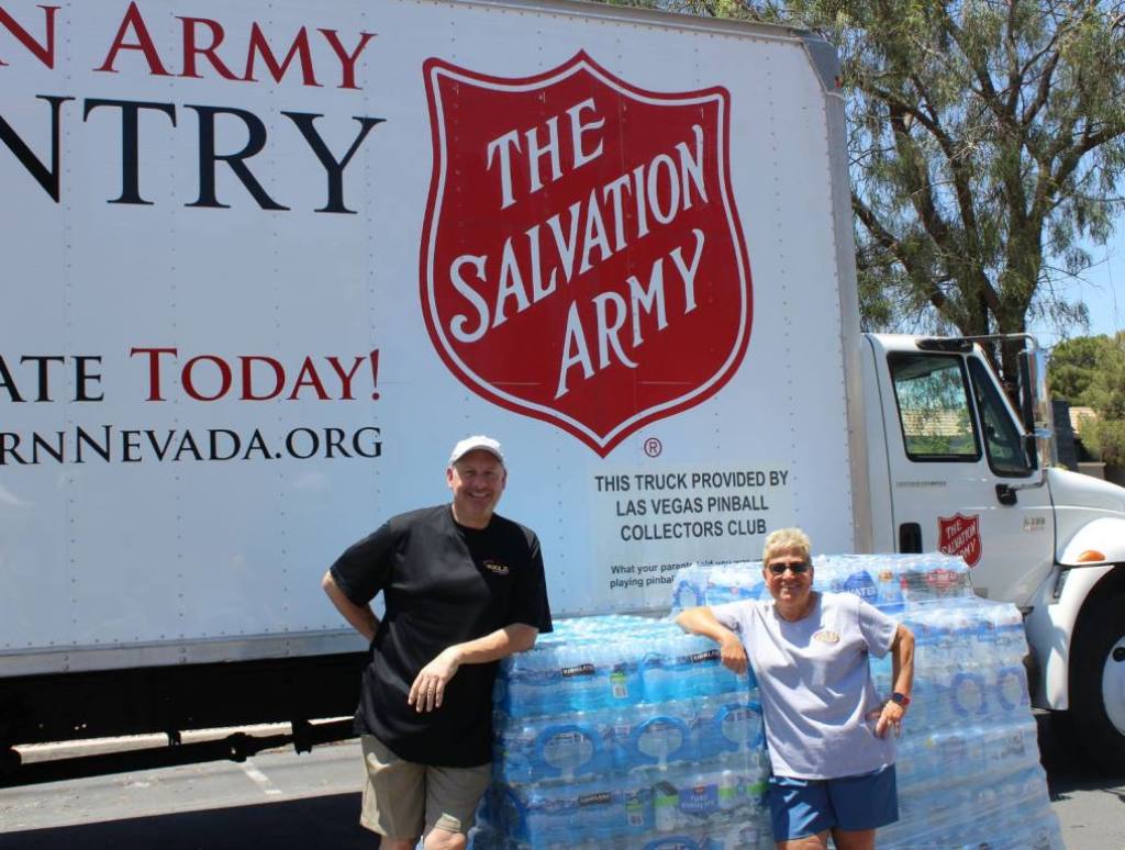 From left to right: Larry Martino and Carla Rea in front of water cases